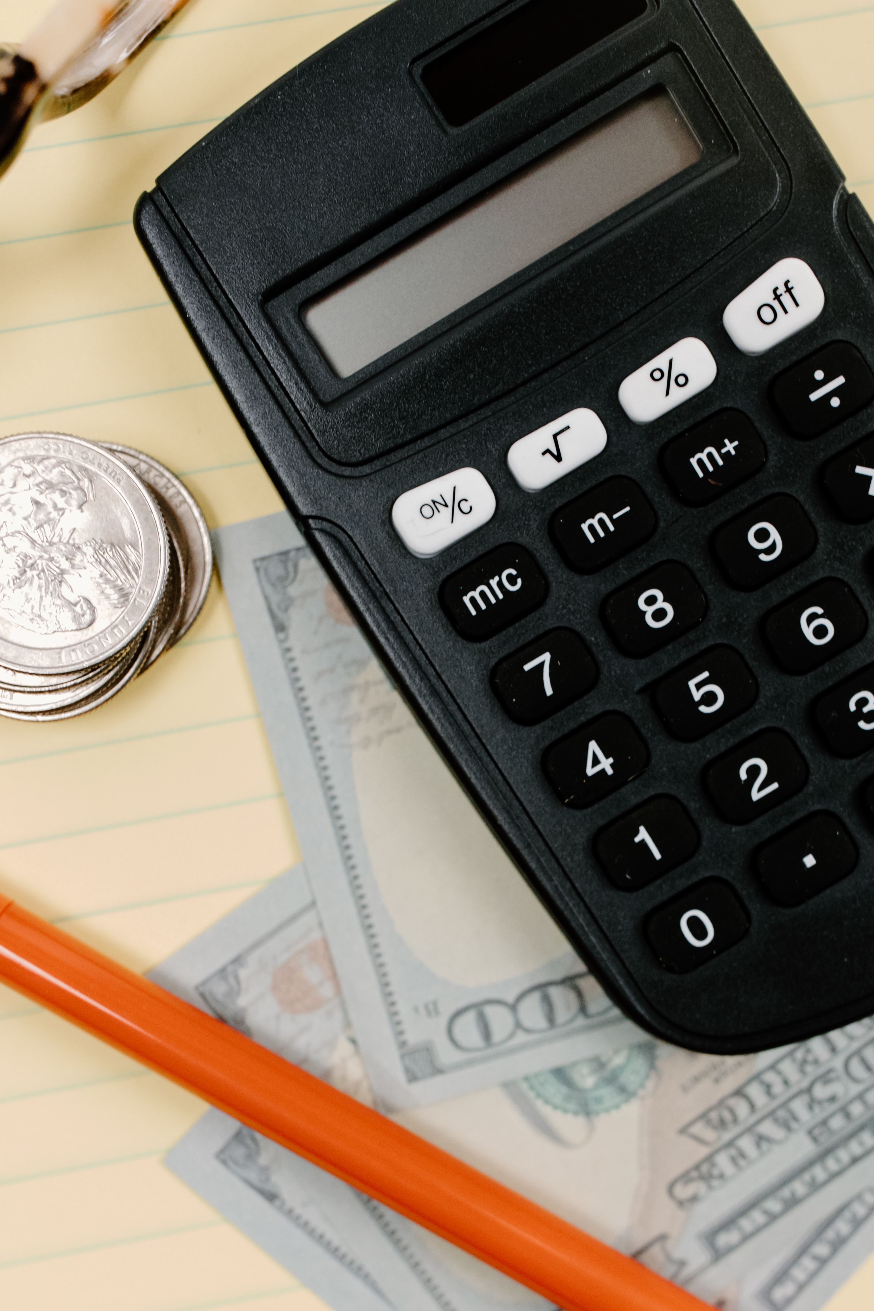 Calculator, savings and coins for financial literacy