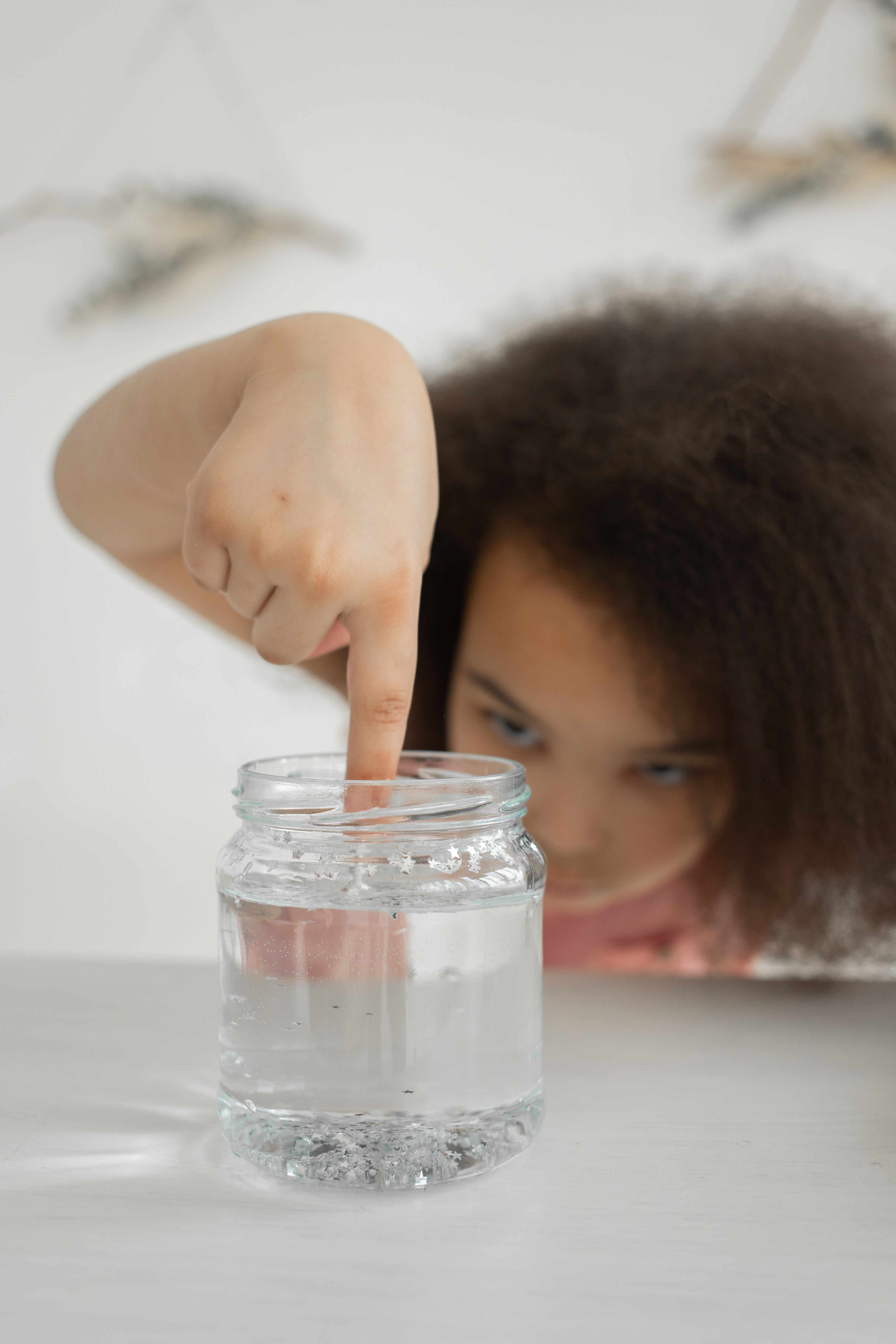 Child performing a science experiment